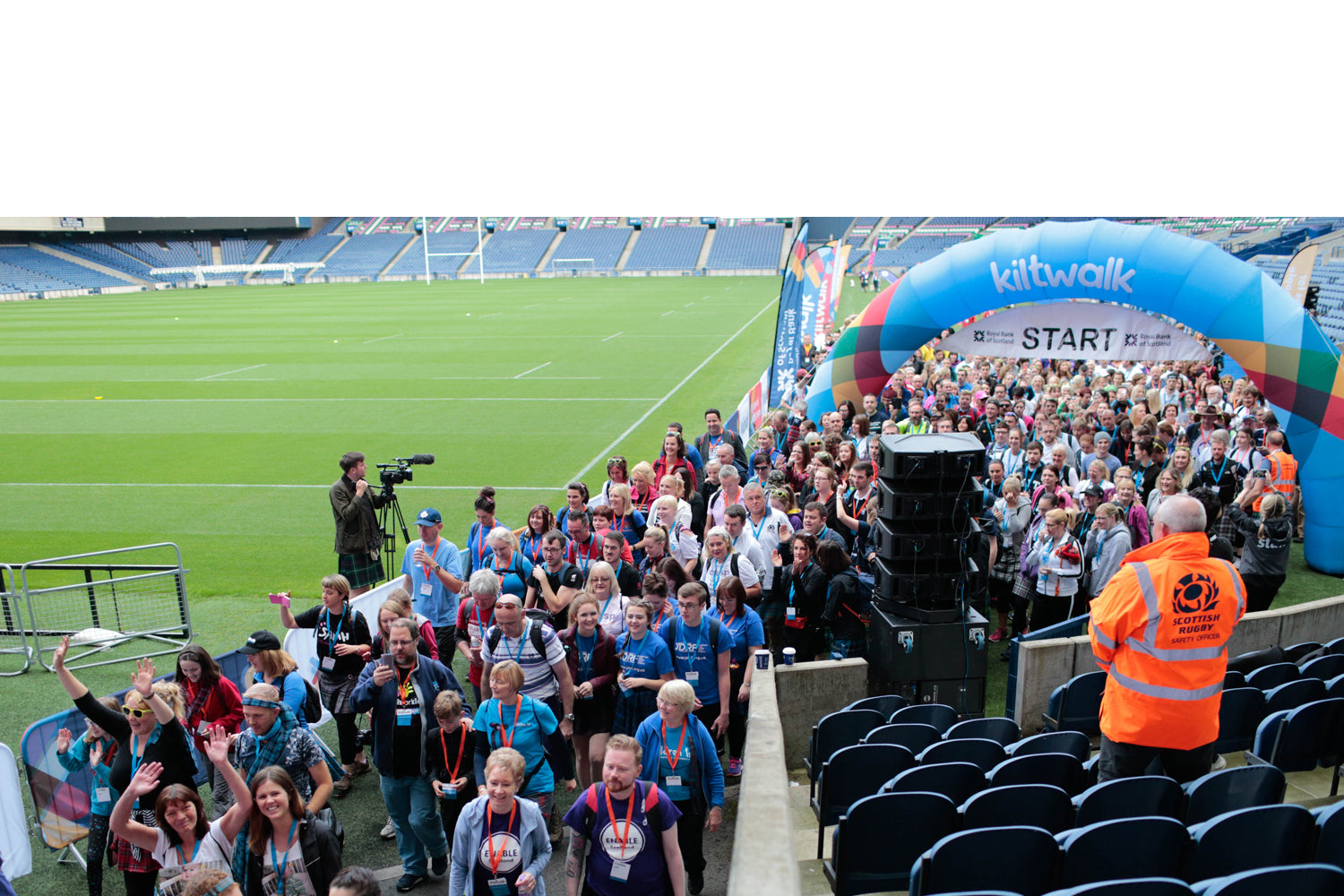 Crowds gather at the start of the Kiltwalk at Murrayfield