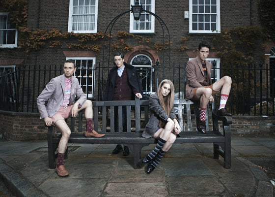 Models wearing tweed blazers